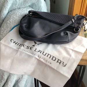 Chinese laundry fold over bag